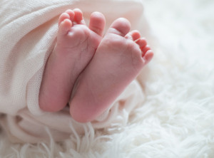 Neugeborenenfotografie zu Hause oder im Studio